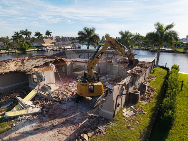 Aerial perspective emphasizing demolition site layout and access roads